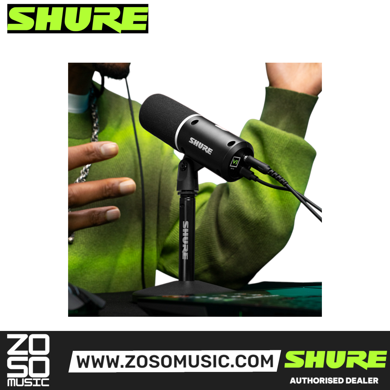 Zoso Music Shure MV6 USB gaming microphone on a desktop stand with a person in a green sweater in the background