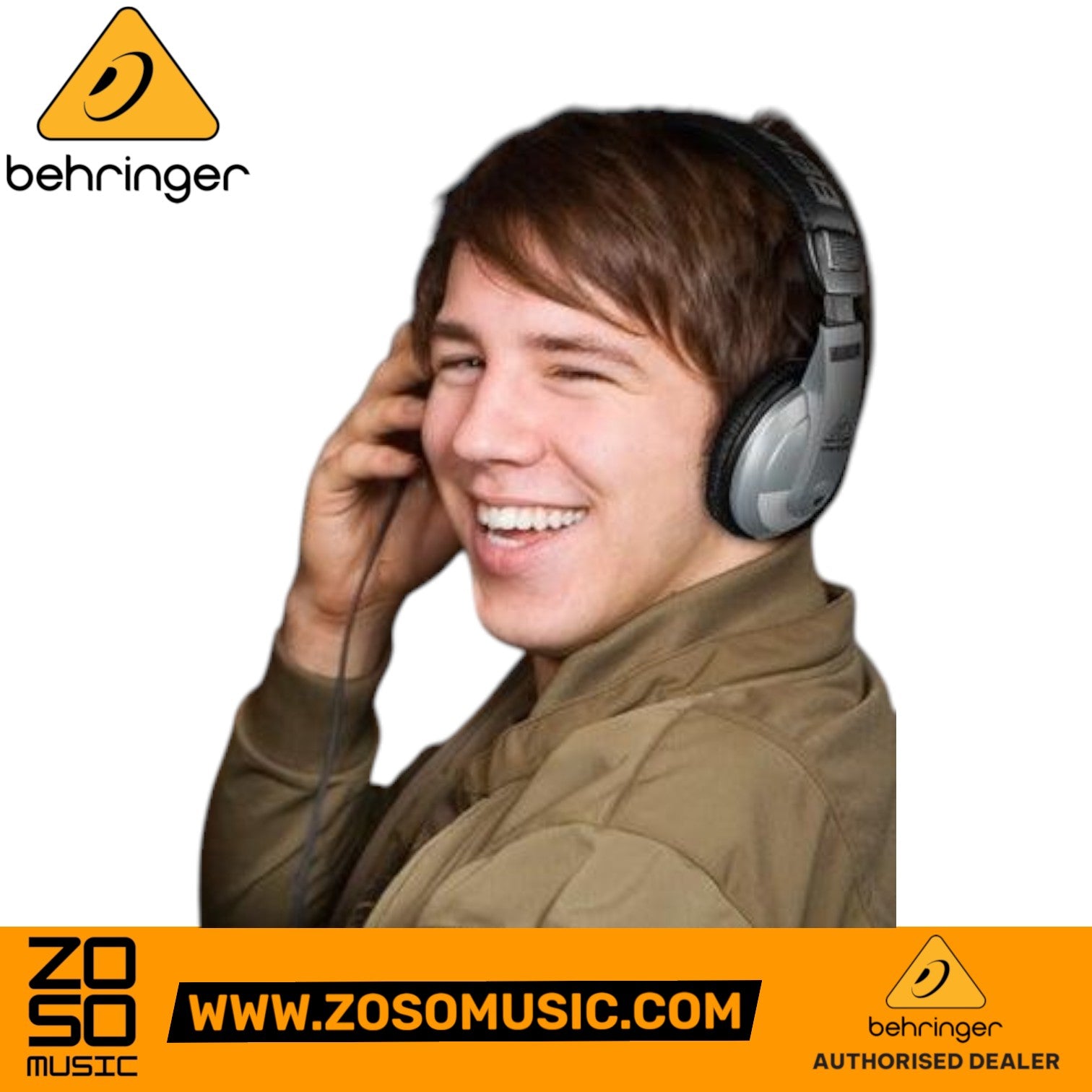 A smiling man wearing Zoso Music Behringer HPM1000 closed-back headphones for podcasting and audio monitoring