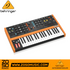 Zoso Music Behringer Poly D analog synthesizer with 37 keys, wood trim, and orange knobs on a black control panel.