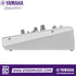 Zoso Music white Yamaha AG08 8-channel streaming mixer and audio interface, side profile view showing control knobs.